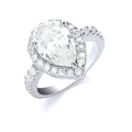 Silver Claw Set Pear Shape Centre CZ Ring