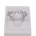 18 carat white gold 11 stone claw set diamond band.