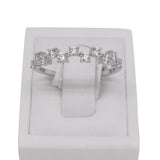 18 carat white gold 11 stone claw set diamond band.