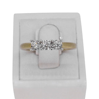 9k yellow gold trilogy ring with diamond cut bezel setting,