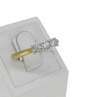 9k yellow gold trilogy ring with diamond cut bezel setting,
