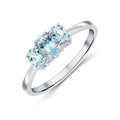 9K White Gold Oval Aquamarine Trilogy Ring
