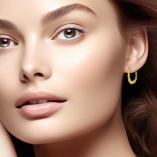 9K Yellow Gold Twisted Creole Hoop Earrings