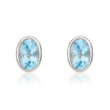 9K White Gold Oval Swiss Blue Topaz Stud Earrings