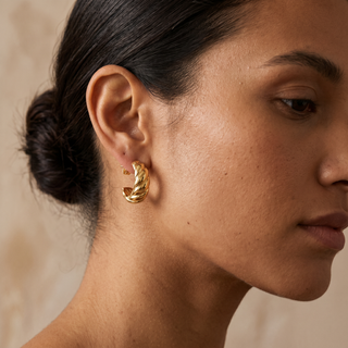Model wearing 9K Yellow Gold Chunky Twist Half Hoop Stud Earrings - Sonny's Jewellers