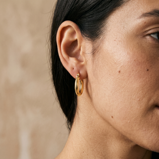 Model wearing 9K Yellow Gold 13mm Polished Hoop Creole Earrings - Sonny's Jewellers