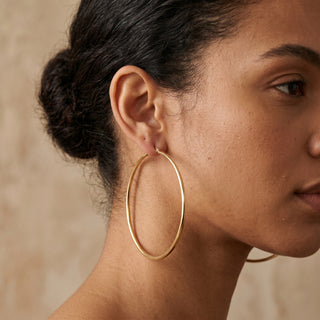 Model wearing 9K Yellow Gold 80mm Plain Hoop Earrings - Sonny's Jewellers