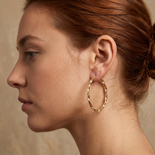 Model wearing 9K Yellow Gold Oval Rope Hoop Earrings - Sonny's Jewellers