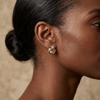 Model wearing 9K Tri-Coloured Knot Stud Earrings - Sonny's Jewellers