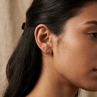 Model wearing 9K Yellow Gold Cartwheel Stud Earrings - Sonny's Jewellers