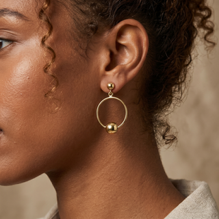 Model wearing 9K Yellow Gold Ring & Ball Drop Earrings - Sonny's Jewellers