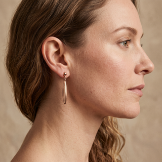 Model wearing 9K Rose Gold Marquise Drop Earrings - Sonny's Jewellers