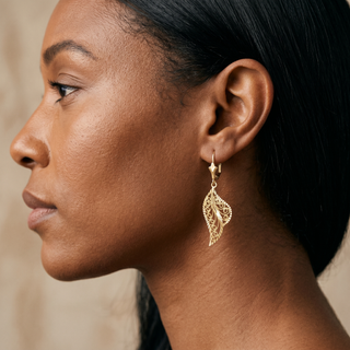 Model wearing 9K Yellow Gold Filigree Drop Earrings - Sonny's Jewellers