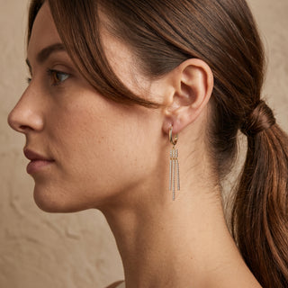 Model wearing 9K Yellow Gold Hoop Drop Earrings - Sonny's Jewellers