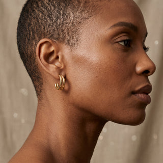 Model wearing 9K Yellow Gold Double Tube Half Hoop Earrings - Sonny's Jewellers