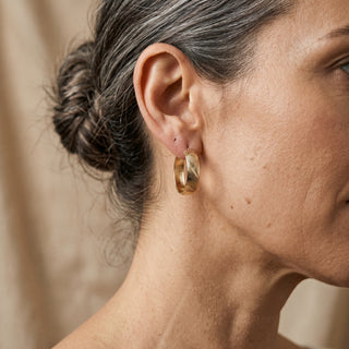 Model wearing 9K Yellow Gold Patterned Hoop Earrings - Sonny's Jewellers
