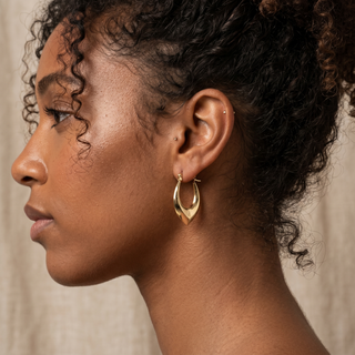 Model wearing 9K Yellow Gold Pointed Creole Earrings - Sonny's Jewellers