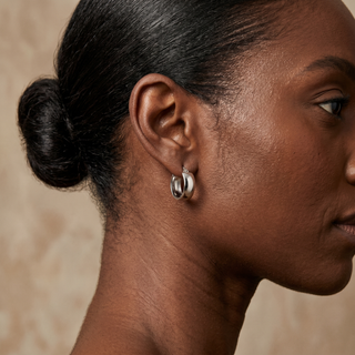 Model wearing 9K White Gold 6mm Band 14mm Creole Hoop Earrings - Sonny's Jewellers