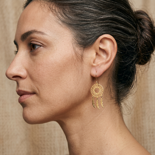 Model wearing 9K Yellow Gold Circle Cutout Dream Catcher Earrings - Sonny's Jewellers