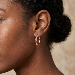 Model wearing 9K Rose Gold Diamond Cut Square Hoop Earrings - Sonny's Jewellers