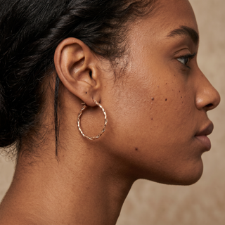 Model wearing 9K Rose Gold Wrap Hoop Earrings - Sonny's Jewellers