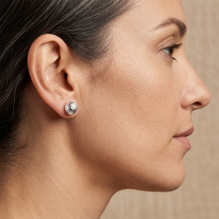 Model wearing 9K White Gold Diamond Cut Ball Stud Earring - Sonny's Jewellers