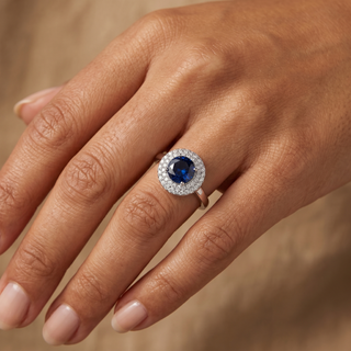 Model wearing 9K White Gold Blue & White Round CZ Cluster Ring - Sonny's Jewellers