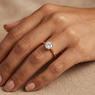 Model wearing 9K Yellow Gold 6mm Round CZ Solitaire Ring - Sonny's Jewellers