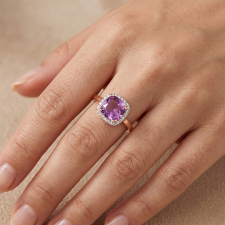Model wearing 9K Rose Gold Cushion Pink Amethyst & Diamond Halo Ring - Sonny's Jewellers