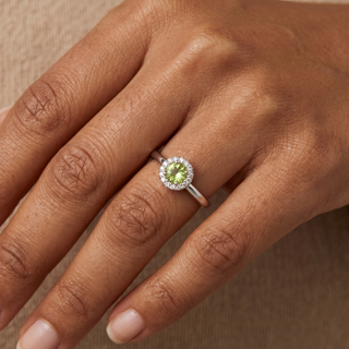 Model wearing 9K White Gold Peridot & Diamond Halo Ring - Sonny's Jewellers