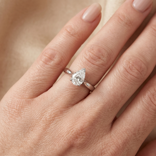 Model wearing Platinum 0.77ct Pear Cut Diamond Ring - Sonny's Jewellers