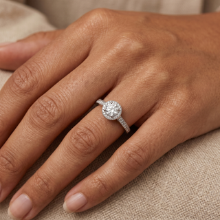 Model wearing Platinum 0.66ct Round Brilliant Cut Diamond Halo Ring - Sonny's Jewellers