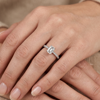 Model wearing Platinum 0.74ct Emerald Cut Diamond Solitaire Ring - Sonny's Jewellers