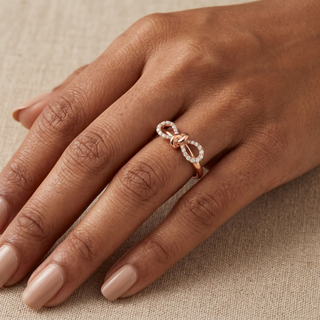 Model wearing 18K Rose Gold 0.18ct Diamond Set Bow Ring - Sonny's Jewellers
