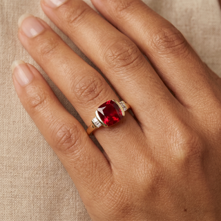 Model wearing 9K Yellow Gold Synthetic Ruby & White Sapphire Ring - Sonny's Jewellers