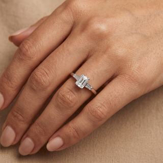 Model wearing Platinum 0.66ct Emerald & Baguette Diamond Ring - Sonny's Jewellers