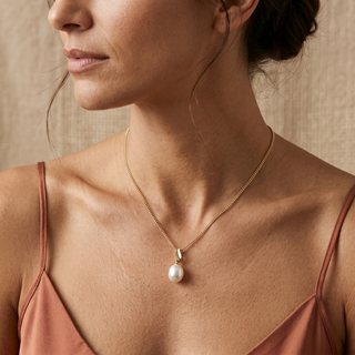 Model wearing 9K Yellow Gold Freshwater Pearl & Curved Ellipse Pendant - Sonny's Jewellers