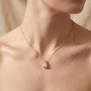 Model wearing 9K Yellow Gold 1mm CZ Teardrop Adjustable Necklace 16"-17" - Sonny's Jewellers