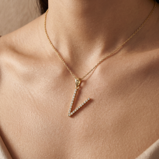 Model wearing 9K Yellow Gold Large Diamond V Initial Pendant - Sonny's Jewellers