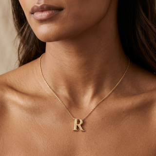 Model wearing 9K Yellow Gold Plain R Initial Pendant - Sonny's Jewellers