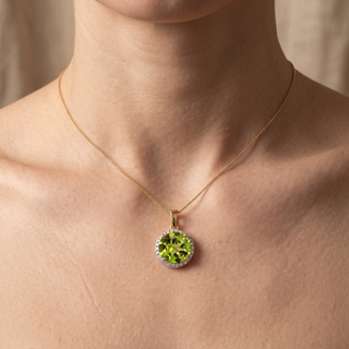 Model wearing 9K Yellow Gold Peridot & Diamond Halo Pendant - Sonny's Jewellers