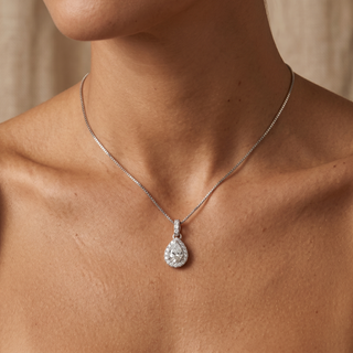 Model wearing 18K White Gold Halo Pear Pendant - Sonny's Jewellers