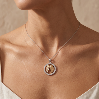 Model wearing 9K Yellow & White Gold Angel Wings Pendant - Sonny's Jewellers