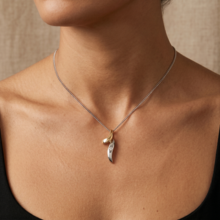 Model wearing 9K Yellow & White Gold Pendant With Diamond - Sonny's Jewellers