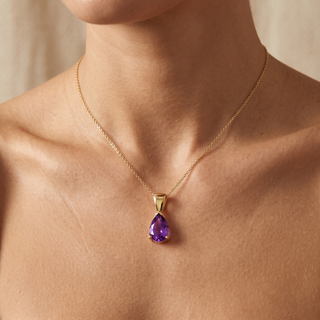 Model wearing 9K Yellow Gold Pear Amethyst Pendant - Sonny's Jewellers