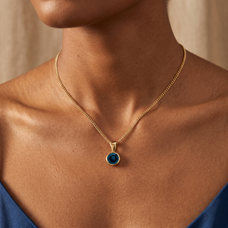 Model wearing 9K Yellow Gold Round Sapphire Pendant - Sonny's Jewellers
