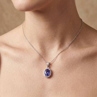Model wearing 9K White Gold Oval Tanzanite & Diamond Pendant - Sonny's Jewellers