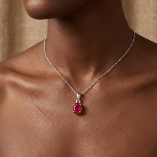 Model wearing 9K White Gold Oval Ruby Claw Pendant - Sonny's Jewellers