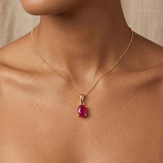 Model wearing 9K Yellow Gold Oval Ruby Claw Pendant - Sonny's Jewellers