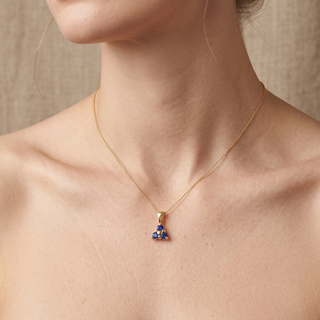 Model wearing 9K Yellow Gold Trefoil Sapphire Pendant - Sonny's Jewellers